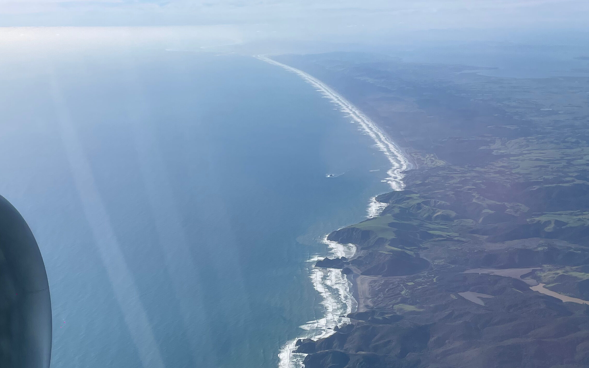 View of the West Coast of the North Island of New Zealand from an Airplane on approach into Auckland Airport