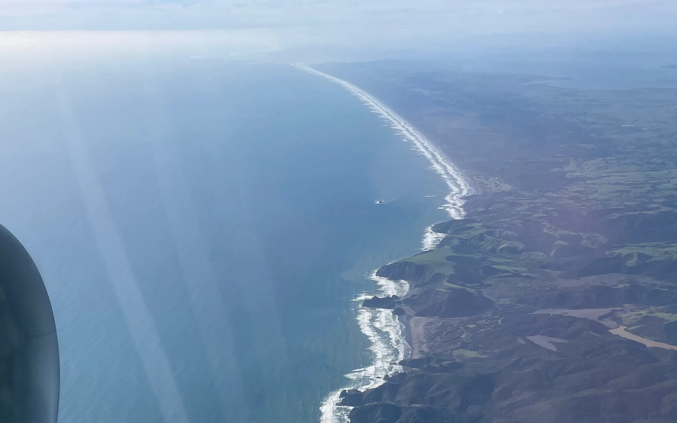 View of the West Coast of the North Island of New Zealand from an Airplane on approach into Auckland Airport