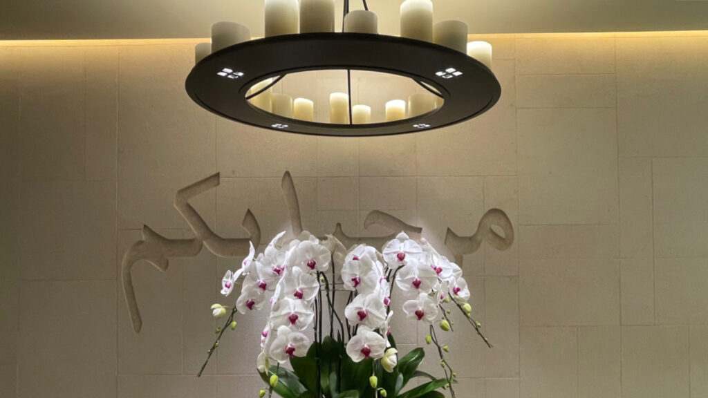 Qatar Lounge at Bangkok Airport Entrance with Orchids