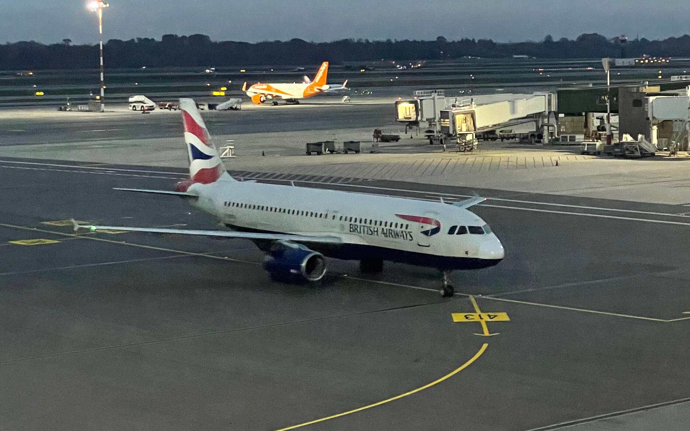British Airways Plane taxiing towards the gate