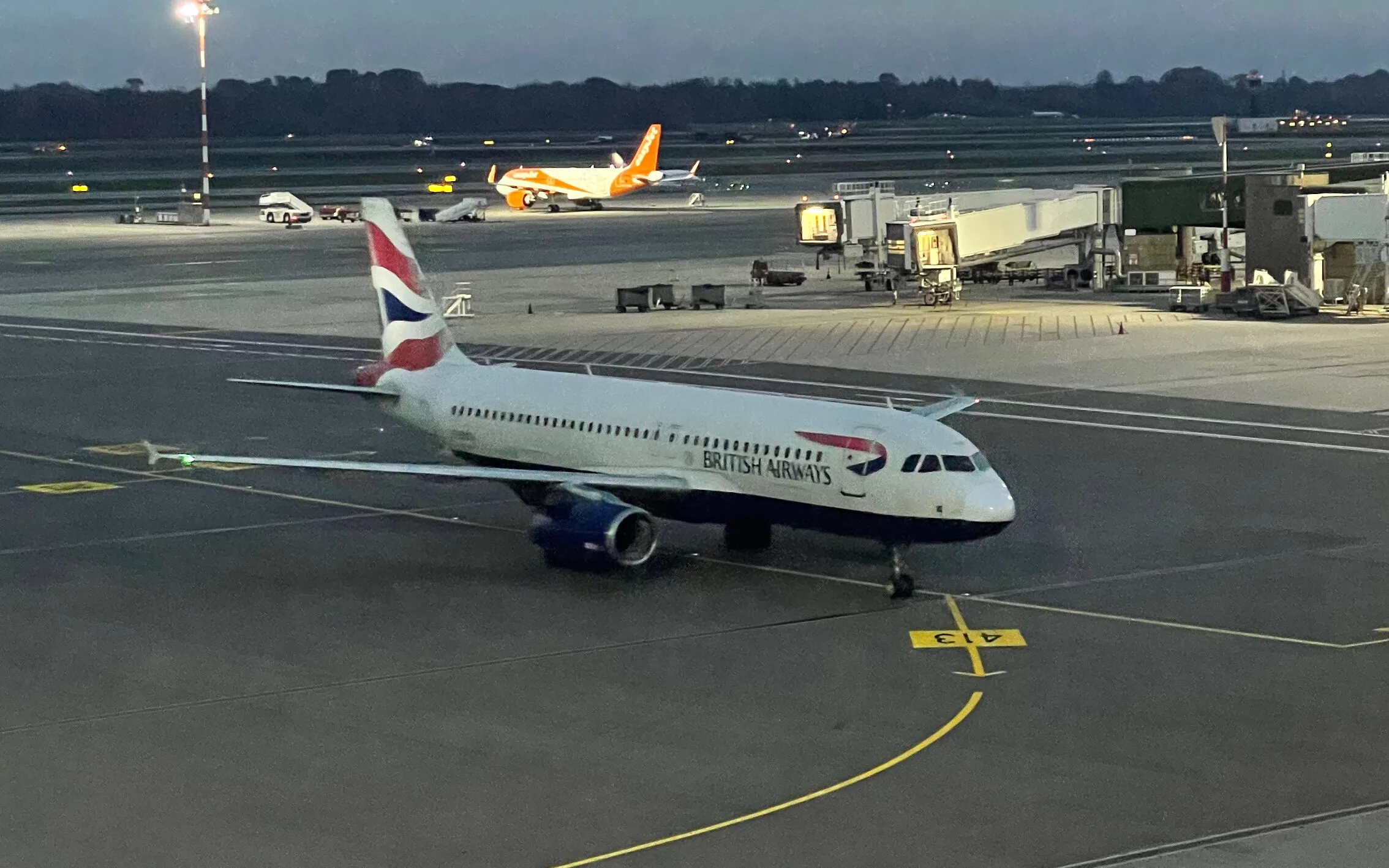 British Airways Plane taxiing towards the gate