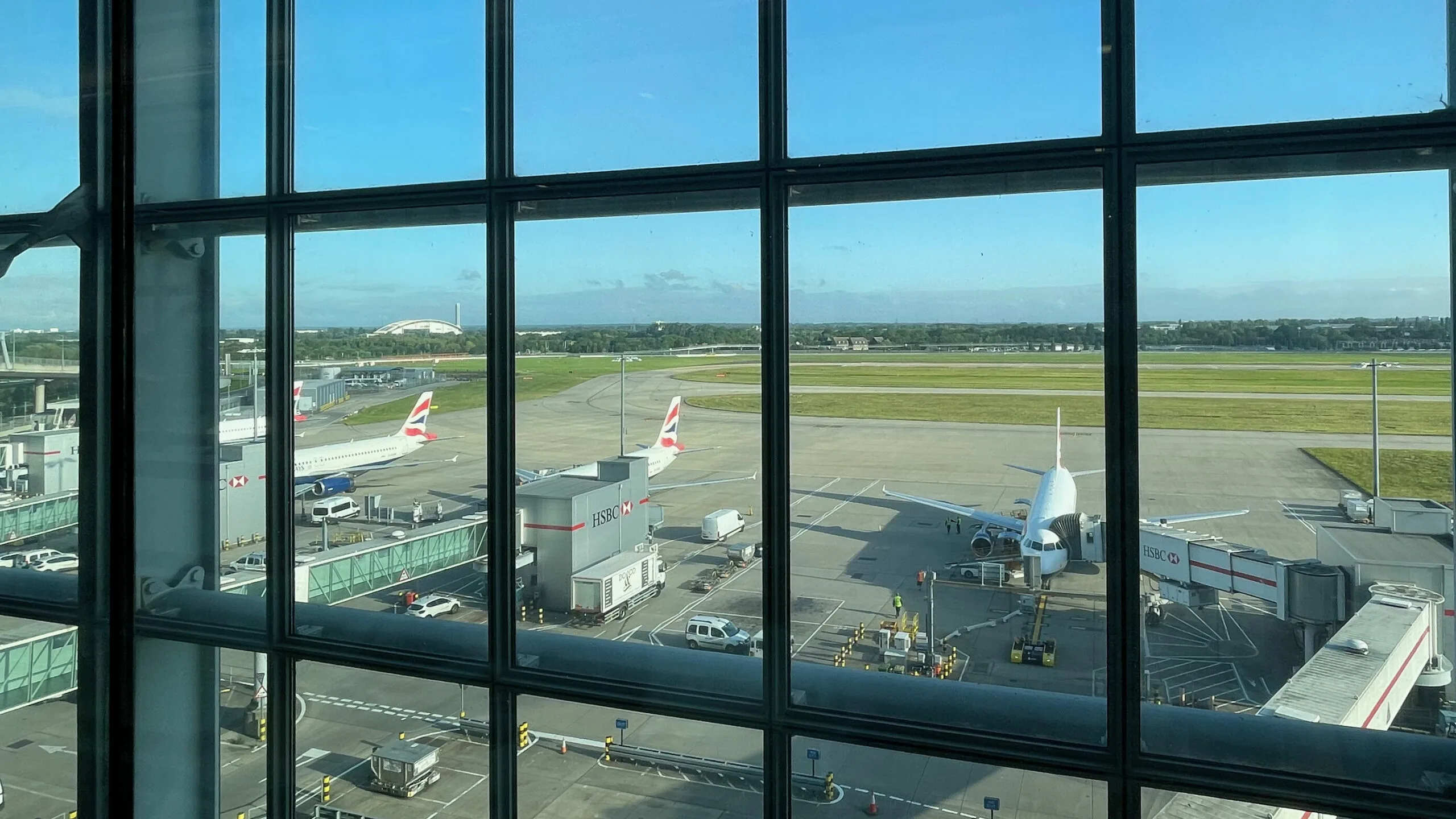 British Airways Planes parked with jetbridges at London Heathrow Terminal 5