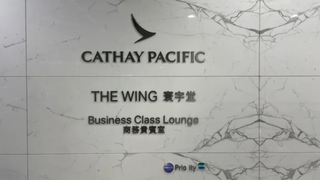 Cathay Pacific The Wing, Business Class Lounge at Hong Kong International Airport sign