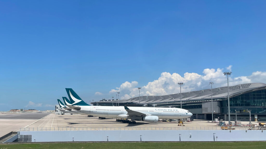 Cathay Pacific planes lined up at Hong Kong International Airport. Flights can be paid for by redeeming airline miles from airline loyalty programs.